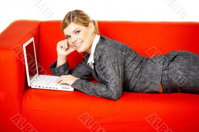 Woman on red couch