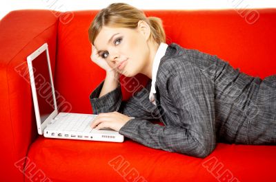 Woman on red couch