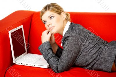 Woman on red couch