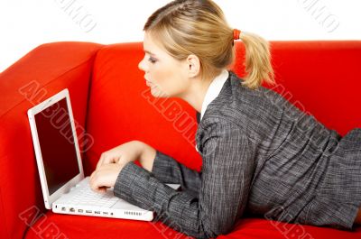 Woman on red couch