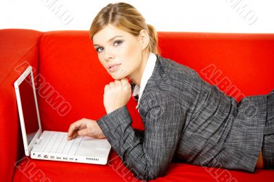 Woman on red couch