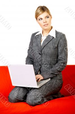 Woman on red couch