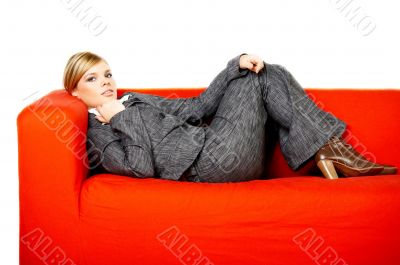 Woman on red couch