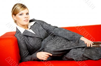 Woman on red couch