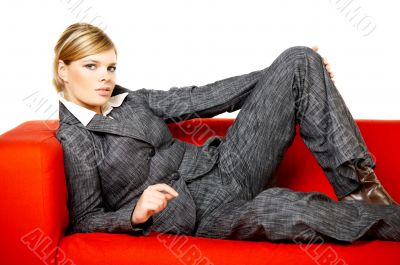 Woman on red couch