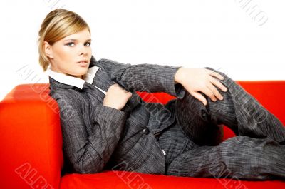 Woman on red couch