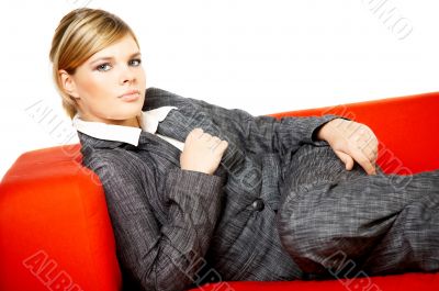 Woman on red couch