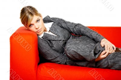 Woman on red couch