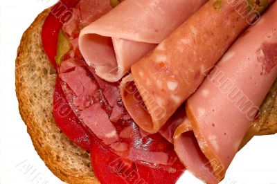 Sandwich with sausage and tomatoes