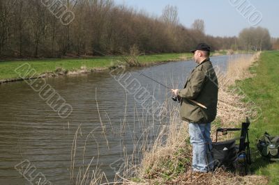 Fisherman by the waterside