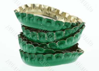 pile of green beer caps