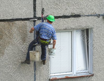 renovation worker on a block of flats