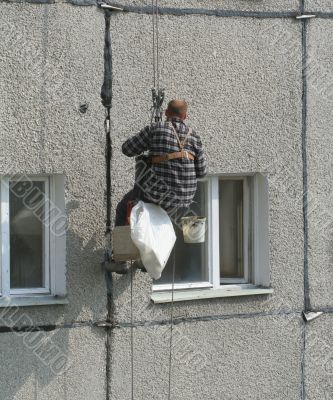 renovation worker on a block of flats