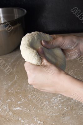 pressing dough