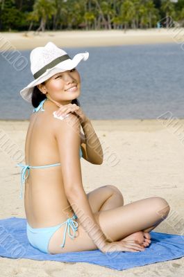 Woman In Hat On Beach