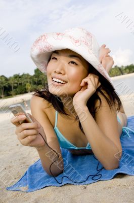 Listening To Music At Beach