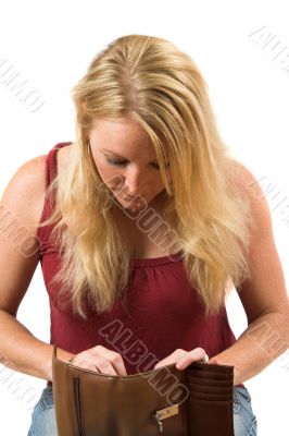 Blond woman checking the content of her wallet