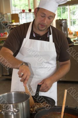 Stirring the mushrooms
