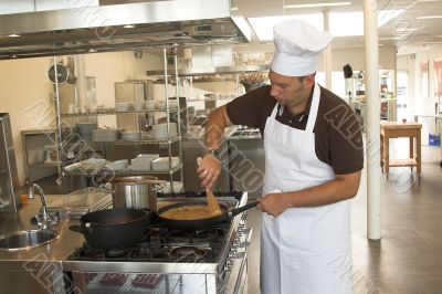 Stirring the pasta sauce