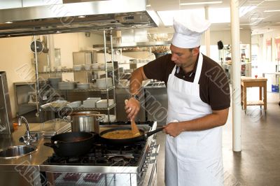 Stirring the pasta sauce