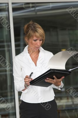 Checking her notes