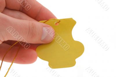 hand holding an empty tag