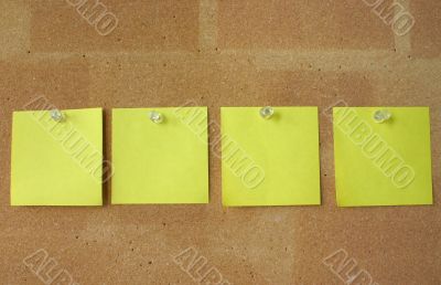 post-it notes pinned in line