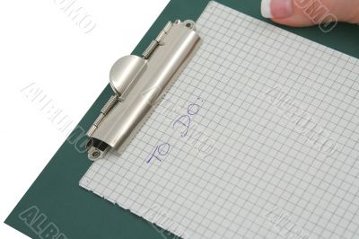 TO DO list stuck to a clipboard