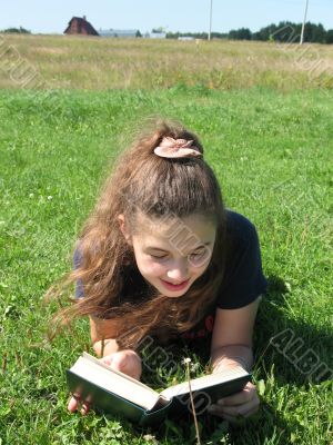 The smile girl with a book