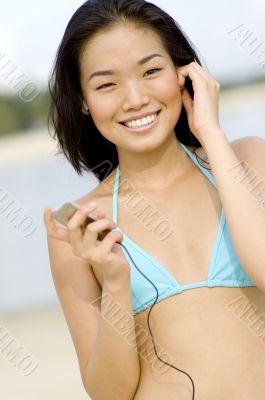 Smiling Woman On Beach
