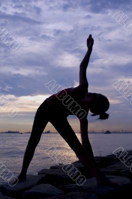 Yoga Stretch At Sunset