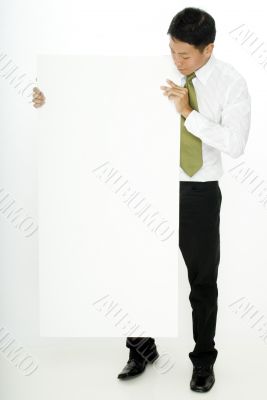 Businessman Holding Board