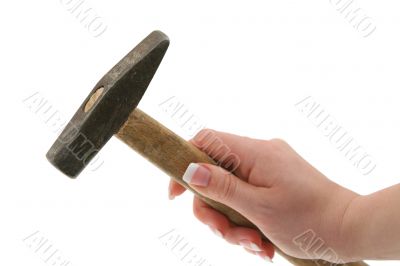 female hand holding hammer