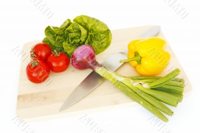 various vegetables and knife isolated