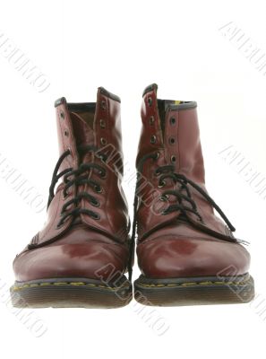 worn boots on white