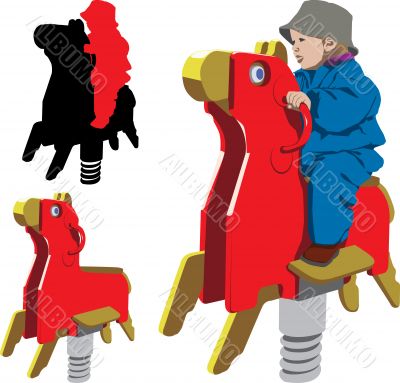 Childr riding rocking horse