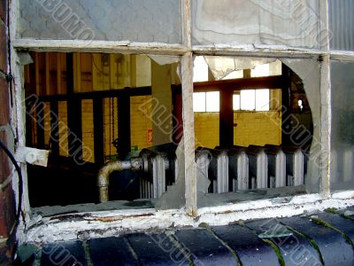 broken window of an abandoned building