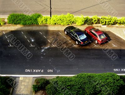 Two cars in car park