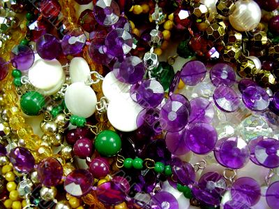 close up of colourful selection of necklaces