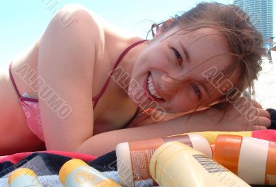Woman at Beach with Sunscreen