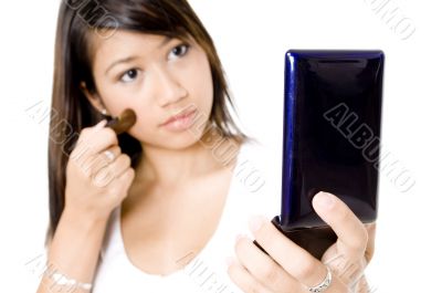 Applying Make-up To Face