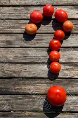 Red tomatoes on table