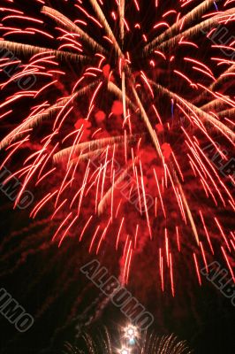 Night celebration fireworks upon dark sky