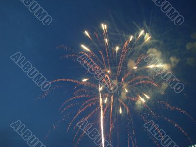 Night celebration fireworks upon dark sky