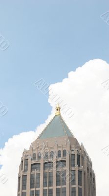 Tower Against Clouds