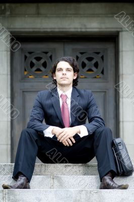 Businessman On Steps