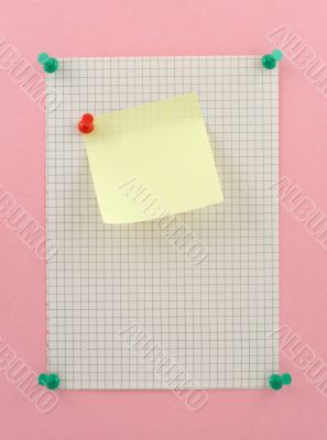 piece of squared paper with post-it