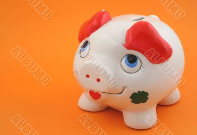 piggy bank on orange