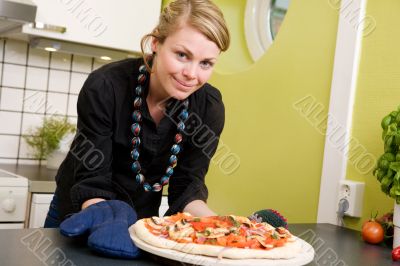 Woman with Fresh Pizza