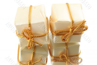 gifts with their reflection on white background